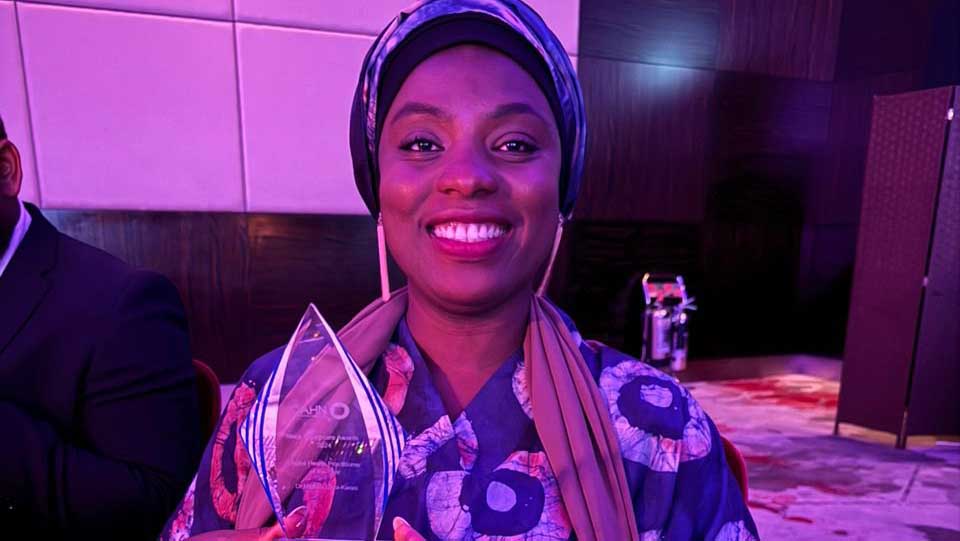 Dr Hibbah Osei-Kwasi holds her award
